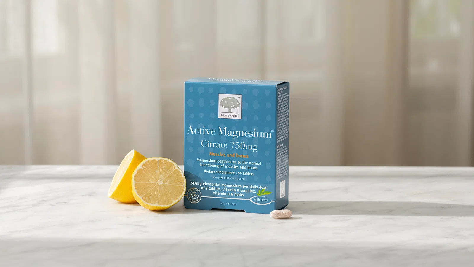 Magic Magnesium™ Citrate package with lemons and a tablet on a light background.