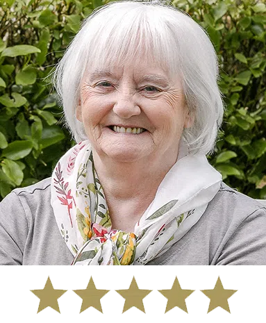 Hair Volume⢠Tablets 11 Woman smiling with five stars displayed underneath.