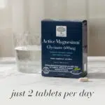 New Nordic Active Magnesium™ Glycinate 600 mg with a glass of water and tablet, with the text “just 2 tablets per day”.