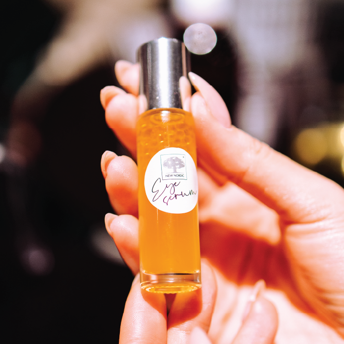 Hand holding small New Nordic bottle.