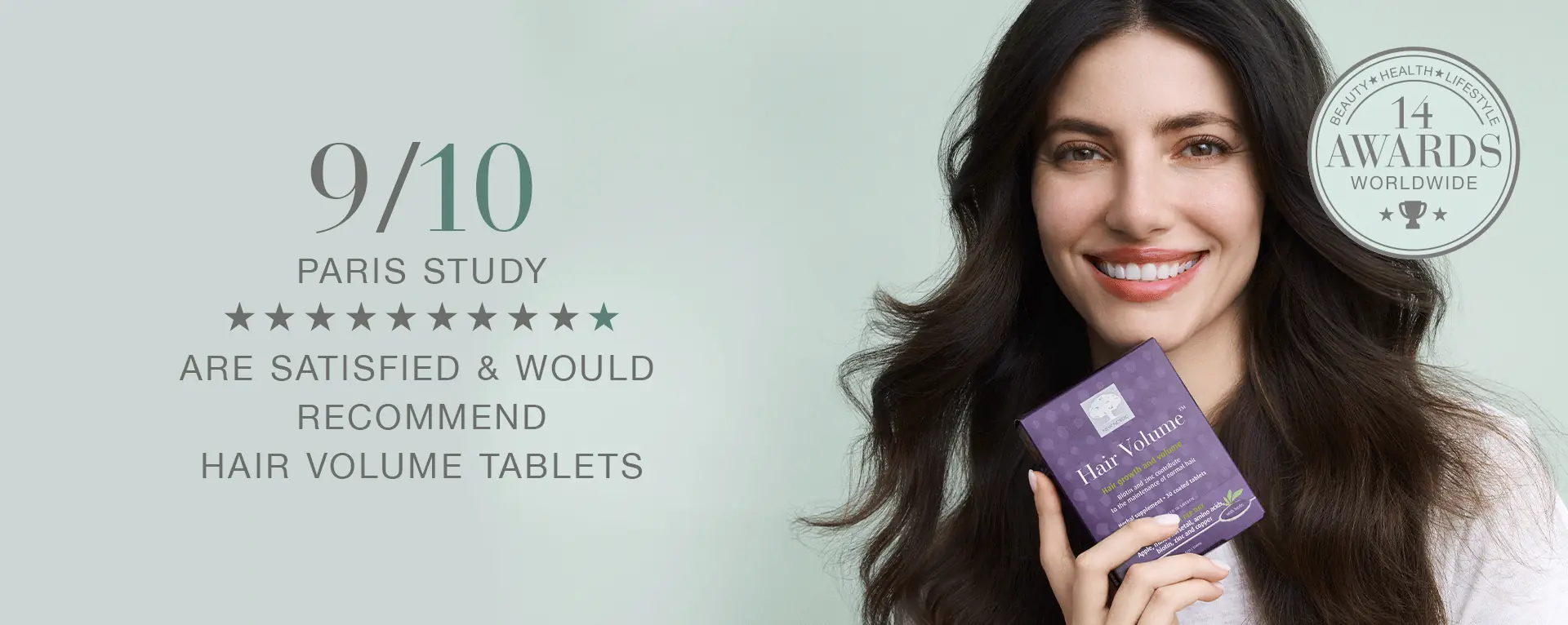 Woman with long dark hair holding Hair Volume™ Tablets, with text about a Paris study and 14 international awards.