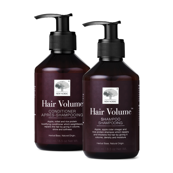 Packshot of the herbal based Hair Volume Shampoo & Hair Volume Conditioner for repair and thickness next to each other.